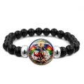 Detailed macro view of Saint Michael Archangel religious cabochon and black beads - Retro Theological Michael (XSWX7933-5)