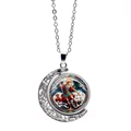 Detailed close-up of Archangel Michael spinning moon pendant with colorful glass art - St Michael Defeating Demon Style (XSWX7952-6)
