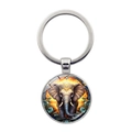Porte-clés en métal argenté avec pendentif dôme en verre d'éléphant ethnique et soleil orange - Éléphant Décoration Ethnique au Coucher du Soleil (XSWX7872-14)
