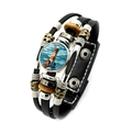 Close-up of multilayer leather bracelet with lighthouse glass cabochon and beads - Red And White Lighthouse Seascape Style (XSWX7991-3)