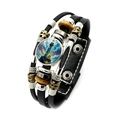 Detail view of multi-layer leather bracelet with lighthouse glass cabochon and bead accents - Sunset Lighthouse Illustration Style (XSWX7991-1)