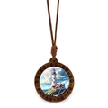 Close-up of a lighthouse wood pendant with detailed spiral carvings on a brown wax cord - Red Roof Cliff Lighthouse (XSWX7996-4)