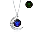 Luminous Taurus necklace with silver hollow moon pendant and blue bull motif in darkness - Luminous Taurus