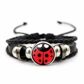 Macro shot of multi-layer leather bracelet with ladybug pattern glass charm - Detailed Ladybug Illustration (XSWX8101-7)