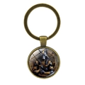 Vintage bronzen Anubis Egyptische god sleutelhanger met ronde glazen cabochon - Antiek Brons