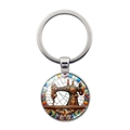 Porte-clés machine à coudre vintage avec anneau en métal argenté et motif coloré - Argenté