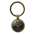 Retro-Schlüsselanhänger aus Bronze mit grünem Pterodaktylus-Drachen-Glasanhänger für Taschen - Antikbronze
