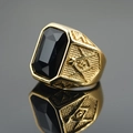 Men's vintage gold Freemason ring featuring a rectangular black gemstone inlay - Gold Band Black Gemstone