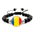 Detailed macro view of Romania flag charm on matte black stone beaded bracelet - Romania