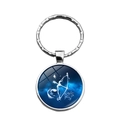 Portachiavi Sagittario in argento con cupola in vetro nebulosa blu e anello metallo - Sagittario