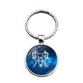 Silver Gemini zodiac keychain with blue starry sky and cosmic constellation pattern - Gemini