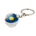 Close-up of blue and yellow soccer glass dome pendant on a silver metal keychain - Blue/Yellow Soccer (XSWX7360-9)