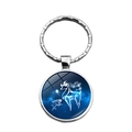 Silver zodiac keychain with deep blue nebula glass dome featuring a white deer pattern - Aries
