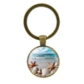 Porte-clés en bronze antique avec design coquillage de plage d'Hawaii sous verre - Bronze Antique