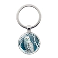 Round silver keychain with a snowy owl pendant and winter forest artistic glass dome - Silver