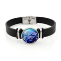Detailed macro view of black leather bracelet with Pisces zodiac glass cabochon - Pisces (XSWX7572)