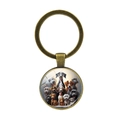 Vintage bronze dog pattern glass gem keychain with cute cartoon canine illustrations - Antique Bronze