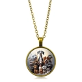 Dettaglio collana vintage in bronzo con ciondolo in vetro e ritratto di cani diversi - Bronzo Antico