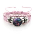 Pink multilayer leather bracelet featuring a glass T-Rex charm and adjustable cord - Pink