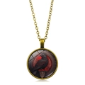 Vintage bronze raven pendant necklace with crow artwork and red textured background - Antique Bronze Style 2