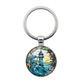 Silberner Schlüsselanhänger mit Vintage-Leuchtturm am Meer und buntem Glasstein - Silber