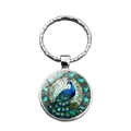 Portachiavi con cabochon in vetro a motivo pavone e anello in metallo argentato - Argento
