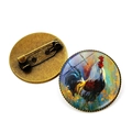 Close-up of rooster oil painting brooch with vintage bronze metal back and glass cabochon - Rooster Pattern 9 (XSWX6640-9) / Antique Bronze