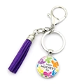 Portachiavi festa della mamma con nappa in pelle scamosciata viola e ciondolo farfalla - Stile Nappina Viola (XSWX6564-4)