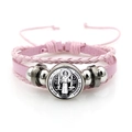 Macro detail of St. Benedict Medal on pink braided leather multilayer bracelet - Vintage Saint Benedict Leather Style (Pink XSWX7252-3)