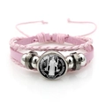 Detail of multi-layer pink leather braided bracelet with St. Benedict religious medal - Vintage Saint Benedict Leather Style (Pink XSWX7252-10)