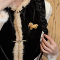 Detail of Songbrocade horse brooch with gold embroidery on black velvet vest - Gold Horse Brooch