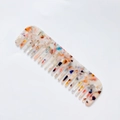Close-up of marble pattern acetate wide-tooth comb for detangling hair - Rainbow
