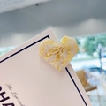 Beige marble pattern heart hair clip on a white card display with elegant texture - Beige
