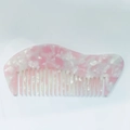 Elegante haarkam met roze en wit marmerpatroon van acetaat en ergonomisch design - Roze & Wit