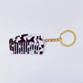 Close-up van draagbare marmerpatroon acetaat mini kam sleutelhanger met gouden metalen ring - Gouden Sleutelhanger / Zwart en Wit - 5.3cm*3.1cm