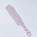 Detailed close-up of pink marble pattern acetate hair comb with wide teeth and handle - Acetate 3mm Thickness / Pink