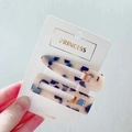 Tortoiseshell acetate hair clips set in beige and navy blue on display card - Light Leopard Style