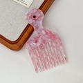 Peigne à cheveux en acétate rose marbré à dents larges avec manche ergonomique - Rose & Blanc