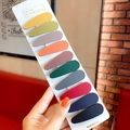 Set of 10 matte drip-shaped hair clips in assorted macaron colors on a display card - Solid Water Drop