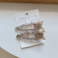 Set of two grey marble acetate cat hair clips with elegant gold decorative details - Gray