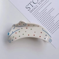 Dettaglio della pinza per capelli in acetato a forma di dalmata con strass colorati e blu - Stile Cane con Intarsi di Strass Colorati / Cane con Strass Colorati