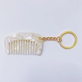 Chique acetaat mini kam sleutelhanger in ivoorwit marmerpatroon met gouden ketting - Rijstwit - 5.3cm*3.1cm