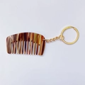 Mini acetaat haarkam sleutelhanger met bruine schildpadtextuur en gouden ring - Koffiebruin - 5.3cm*3.1cm