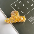 Detail of floral acetate hair claw clip with sparkling rhinestones and metal spring - 7.5cm / Floral Yellow