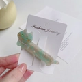Cute green marble acetate cat hair clip with pearls and rhinestones on a card - Teal