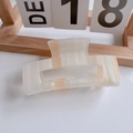 Macro detail of cream white square hair claw clip with elegant pearlescent texture finish - Large Hollow Square Claw Clip