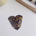 Portable heart-shaped acetate hair comb featuring classic tortoiseshell pattern design - Classic Leopard