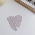 Light purple marble heart-shaped acetate hair comb with anti-static teeth on white background - White Marble Pattern