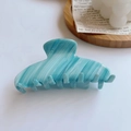 Detail view of large acetate hair claw clip with blue and cream marble pattern - 14# Diagonal Sky Blue