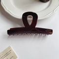 Große dunkelbraune Haarklammer aus Acetat mit goldenem Logo im eleganten Schildpatt-Stil - Braun